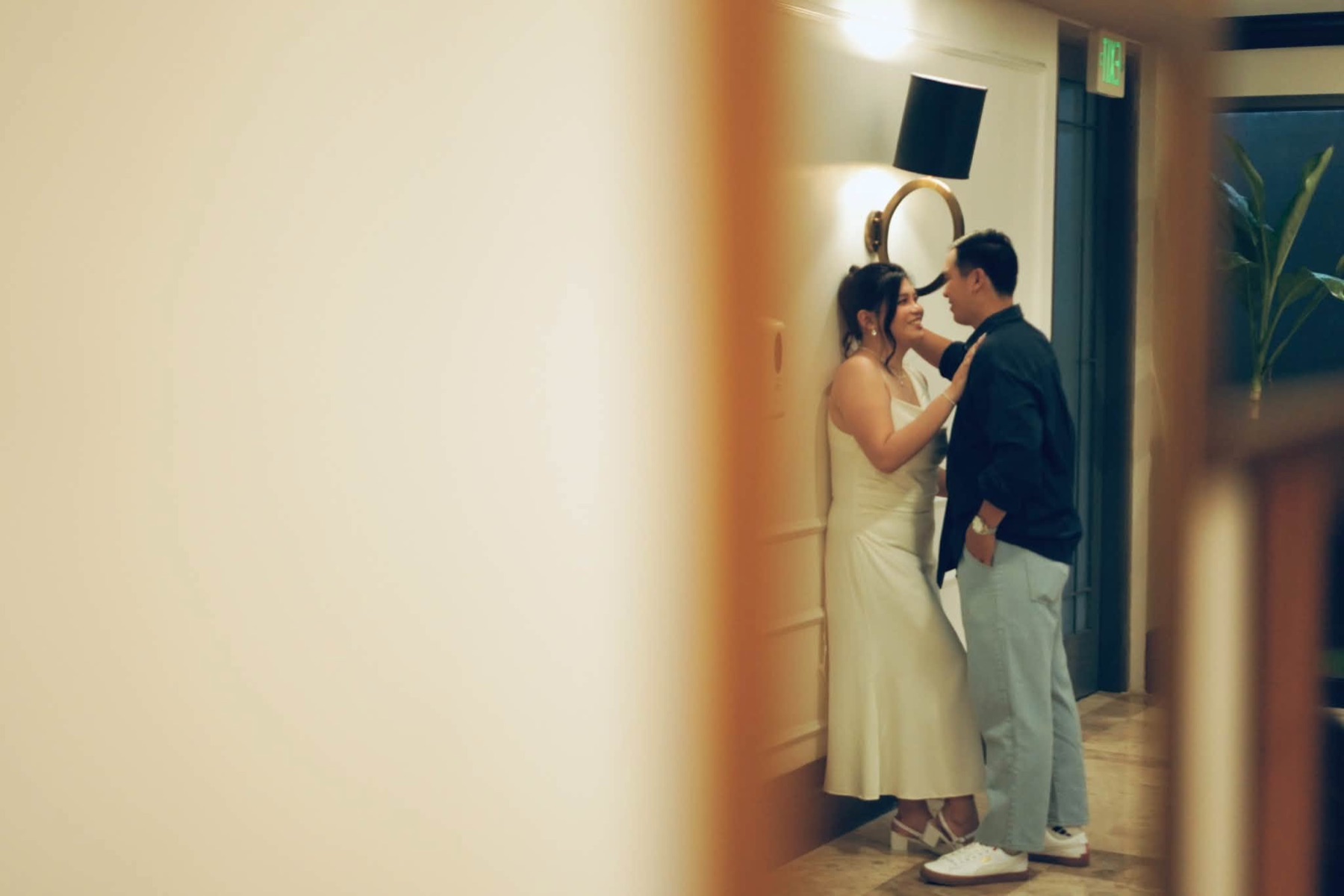 Rachel and Jasper together in a doorway